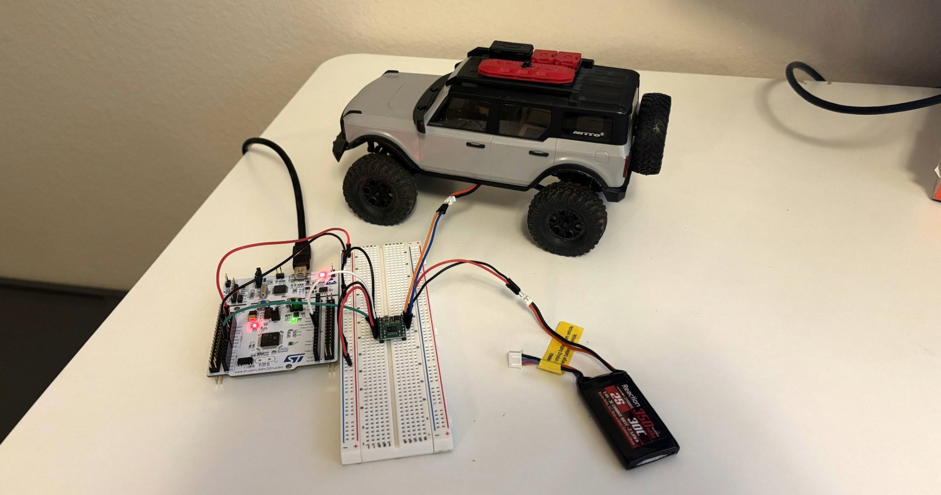 1/24 Bronco wired up to the STM32, DRV8874 and battery.